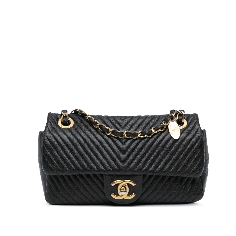 Metallic Shoulder Bag in Gold for Special OccasionsBlack Chanel Small Chevron Wrinkled Lambskin Medallion Charm Surpique Flap Shoulder Bag